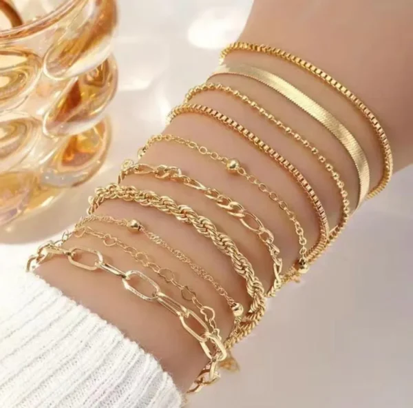 Cód. 349 - Conjunto De 10 Pulseiras Femininas Banhadas A Ouro 18k Luxo Comprimento 20 Cm Cor Dourado Diâmetro 20 Cm